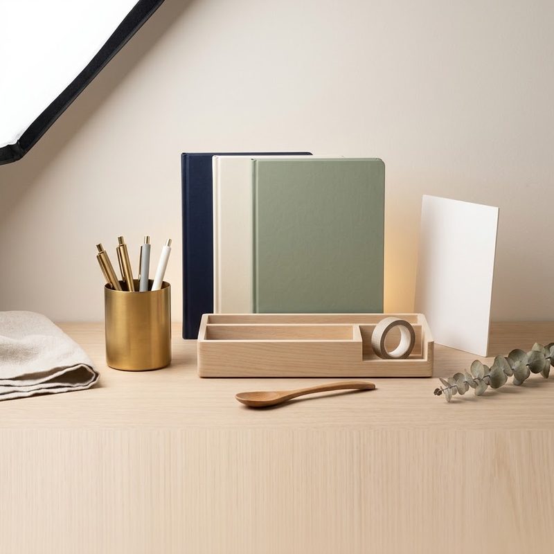 Stationery and office items arranged as a still life